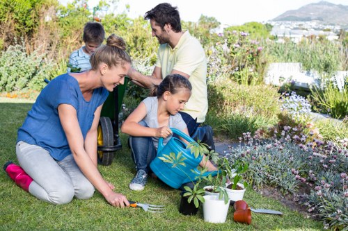 Professional garden maintenance team at work in Leyton